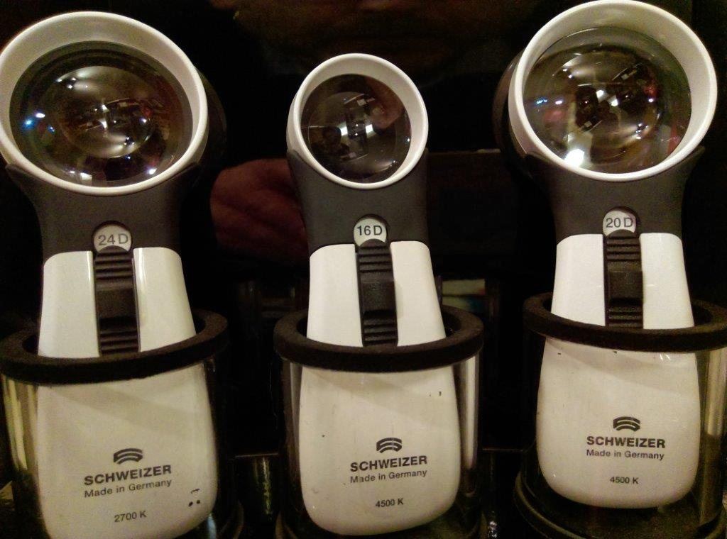 Schweizer illuminated magnifiers, fitted to the job, from reading letters to checking labels.